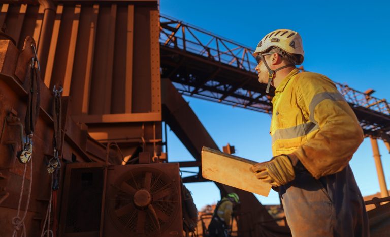 Miner,Engineer,Planer,Holding,A,Planing,Book,While,Looking,Up