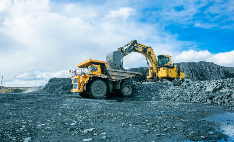 Work,Of,Trucks,And,The,Excavator,In,An,Open,Pit