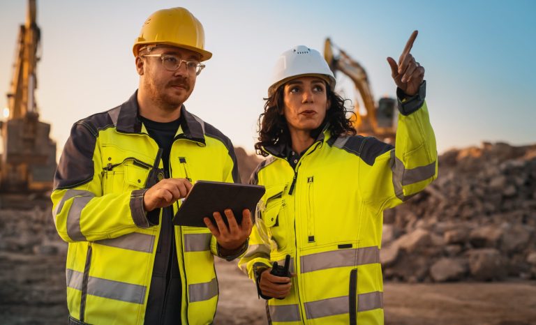 Caucasian,Male,Civil,Engineer,Talking,To,Hispanic,Female,Inspector,And