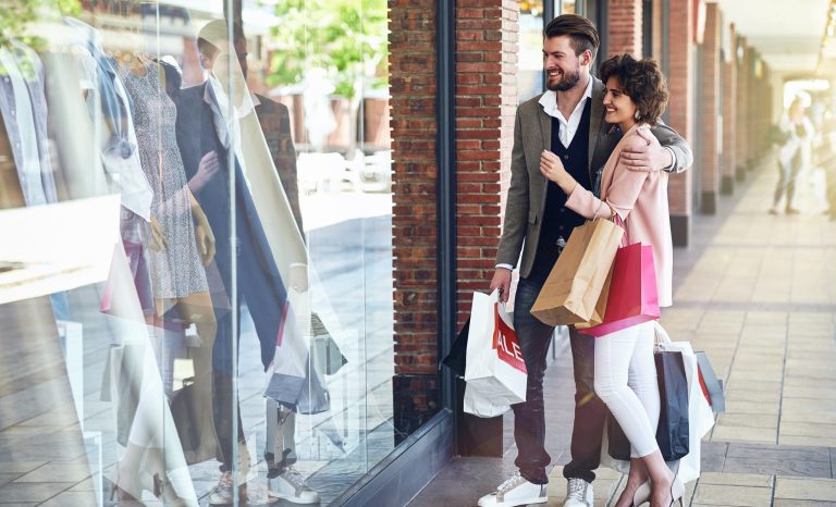 Shopping,,Retail,Window,And,Couple,In,City,With,Bags,For